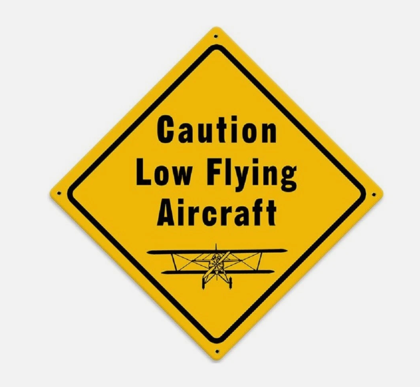 Caution low flying aircraft sign